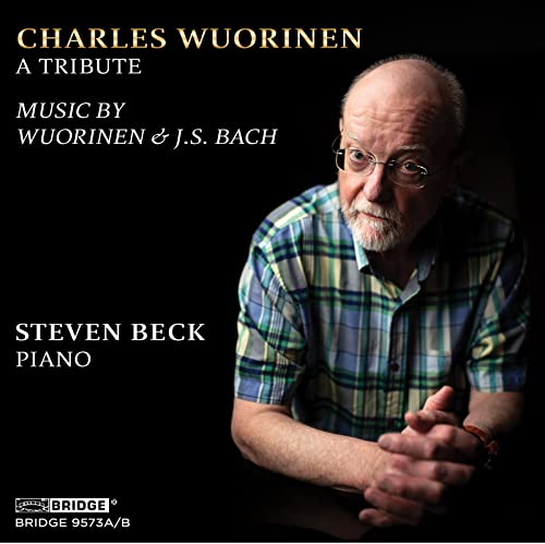 CDLL Album cover featuring a manCHS man in a plaid shirt against black background.