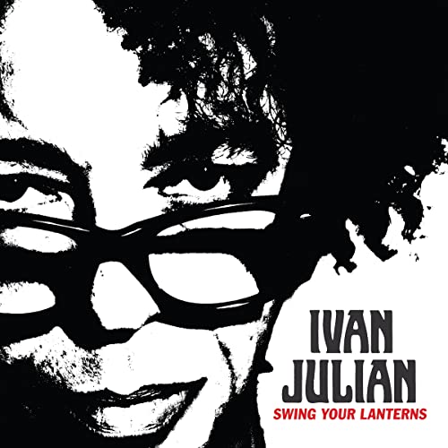 Black and white portrait of a person with sunglasses, album title text.