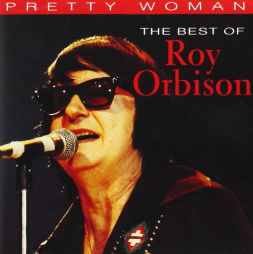 Roy Orbison in sunglasses singing into a microphone on CD cover.
