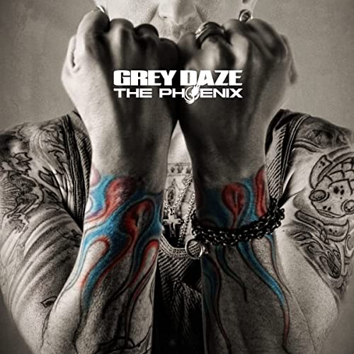 Album cover for Grey Daze’s “The Phoenix” featuring tattooed arms.