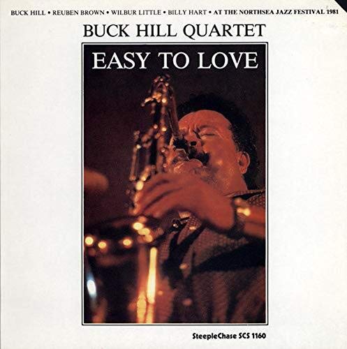 Vinyl record cover: Buck Hill Quartet, a saxophonist performing onstage.