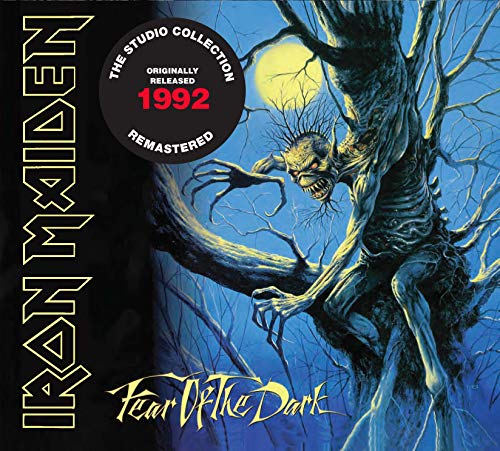 Iron Maiden “Fear of the Dark” CD cover with a monstrous figure in a tree.