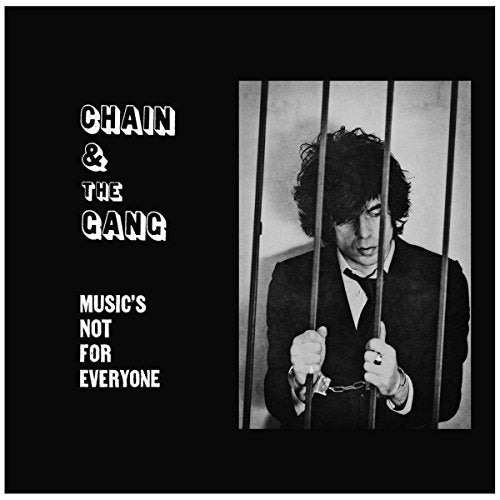 Black and white album cover with a man behind prison bars.