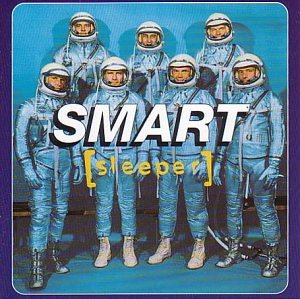 CD cover featuring seven people in blue astronaut suits.