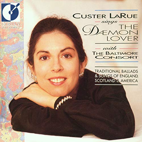 CD cover featuring Custer Larue, a woman with dark curly hair, smiling.