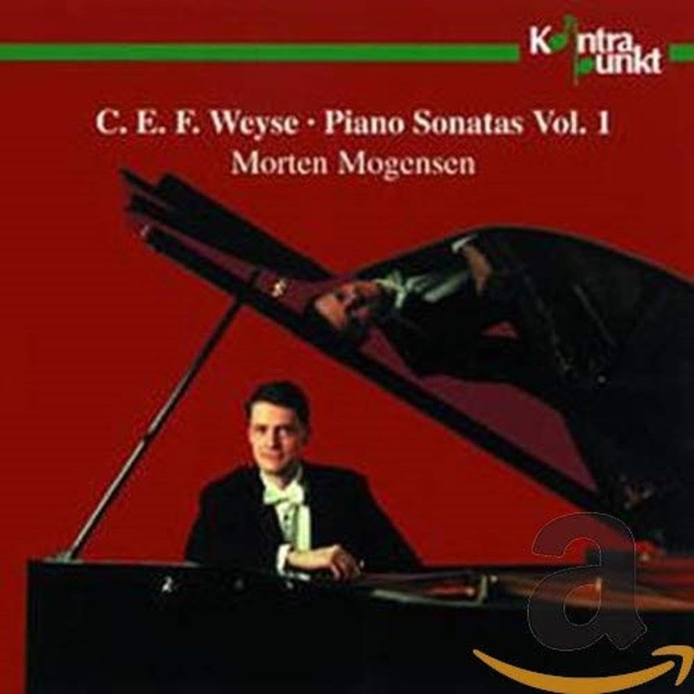 CD cover: pianist Morten Mogensen with a grand piano, red background.