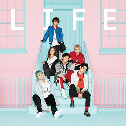 Group of six people on and around light blue stairs.