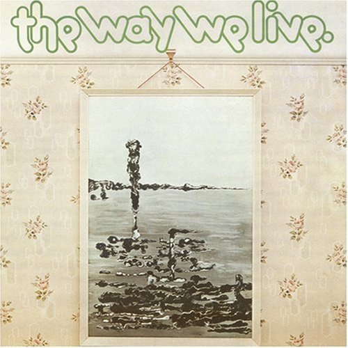 Record cover with a painting of a cross on a beach scene.