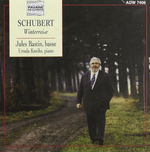 CD cover: Jules Bastin portrait in a wintry forest landscape.