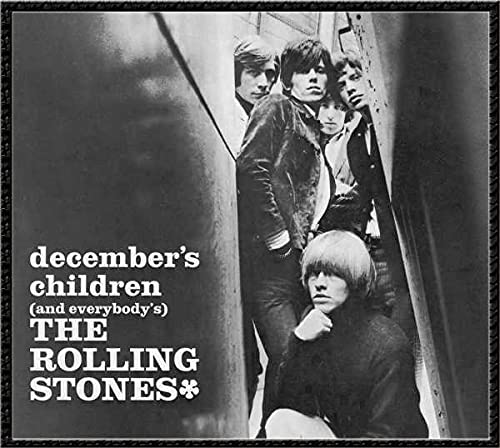 Black and white album cover featuring The Rolling Stones band members in a doorway.