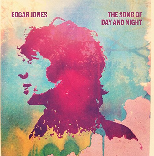 CD cover featuring a magenta silhouette of a person against a multicolored background.