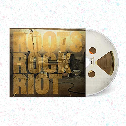 Skindred āRoots Rock Riotā CD case with open disc visible.