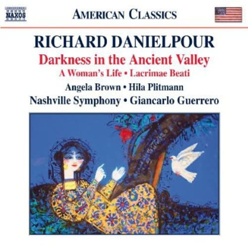 CD cover: woman in patterned clothing, tree, and white dove.