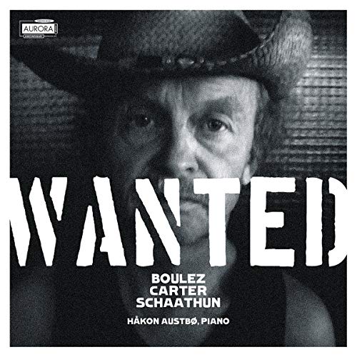 Black and white CD cover featuring a man in a hat with "WANTED" text.