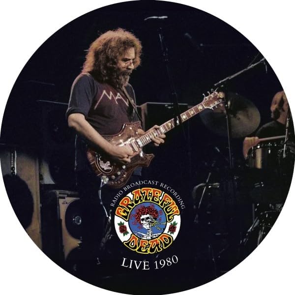 Jerry Garcia playing guitar on a colorful Grateful Dead picture disc.