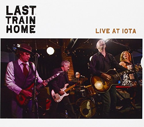 CD cover featuring a live band performing on stage with musicians.
