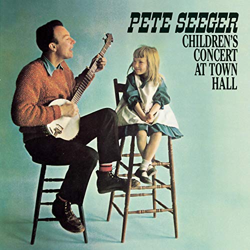 Pete Seeger playing banjo with a young girl, album cover.
