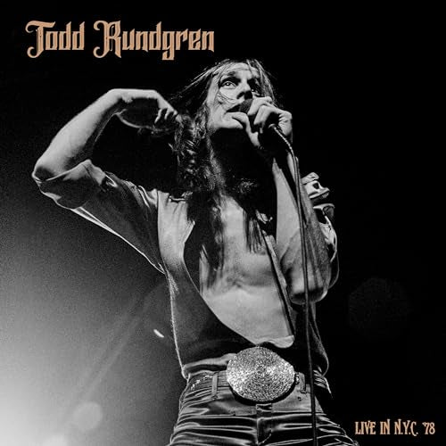 Black and white album cover of Todd Rundgren singing into a microphone.