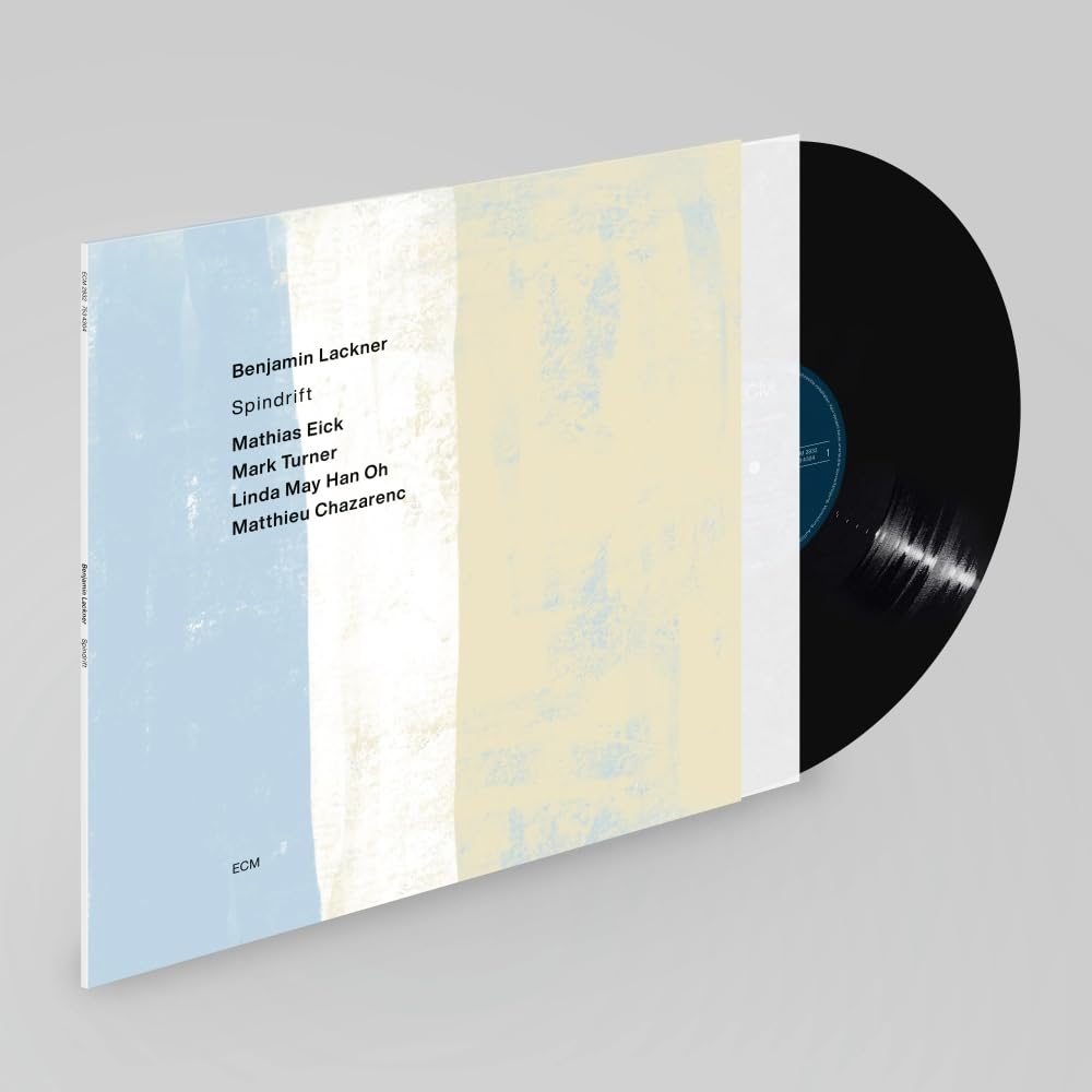 Vinyl record with a light blue and white striped album cover.