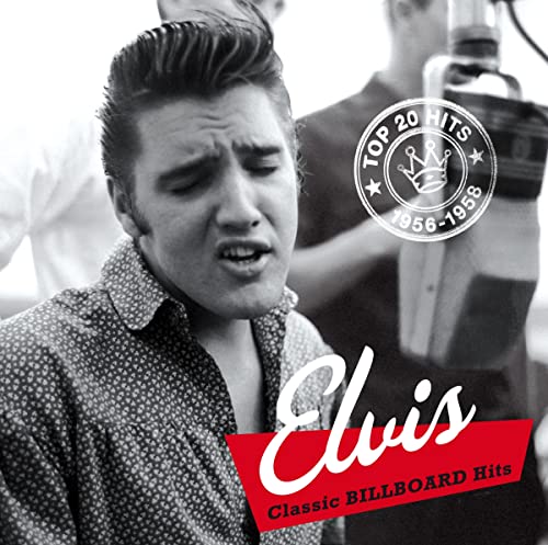Black and white photo of Elvis Presley singing into a microphone.
