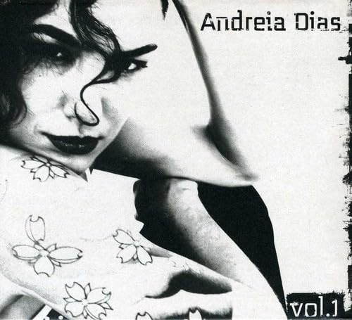 Black and white CD cover featuring a woman with dark makeup and floral designs.