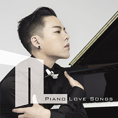 CD cover featuring a man in profile next to a piano.