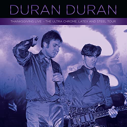Duran Duran album cover featuring two band members in performance.