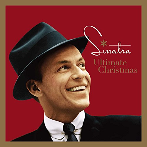 Frank Sinatra in a hat smiles on a red āUltimate Christmasā album cover.