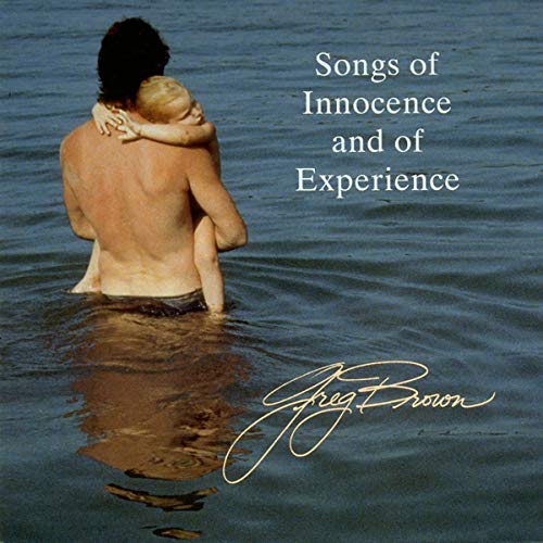 CD cover: man and baby in water, text "Songs of Innocence.