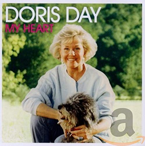 Doris Day album cover featuring her with a small, dark dog.