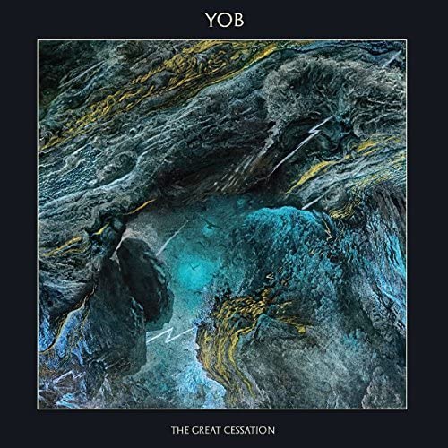 Yob album cover: abstract dark blue and gold textured rock formations.