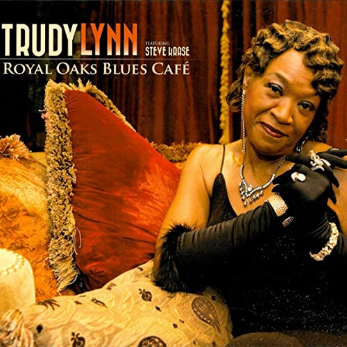 Trudy Lynn album cover, portrait of a Black woman with ornate pillows.