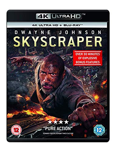 “Skyscraper” DVD cover featuring Dwayne Johnson amidst explosions and a burning city.