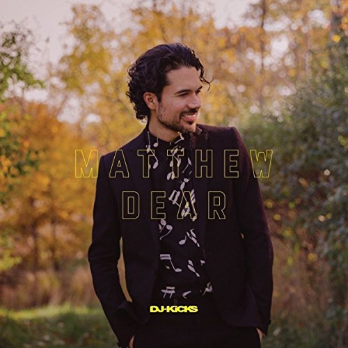 Matthew Dear album cover featuring a man in a suit amidst trees.