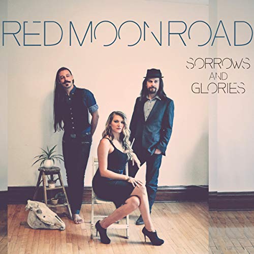 CD cover featuring three people and the album title “Sorrows and Glories”.
