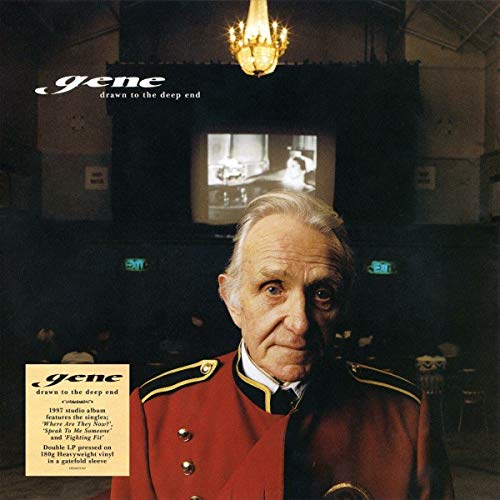 Album cover featuring an older man in a red jacket, with a screen behind him.