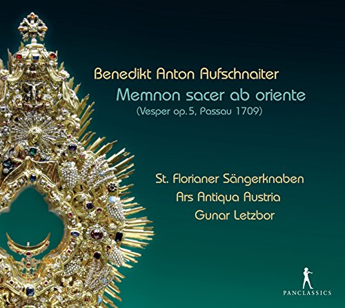CD cover with ornate gold sculpture against a teal background.