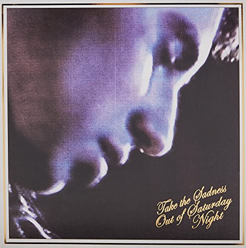 Close-up of a face with the album title “Take The Sadness Out Of Saturday Night.”