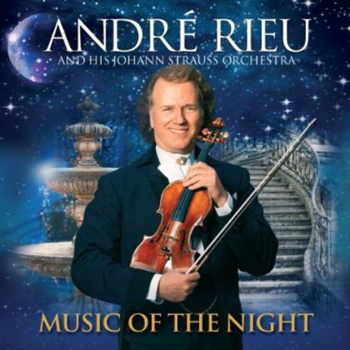 Andre Rieu holding a violin, album cover for "Music Of The Night".