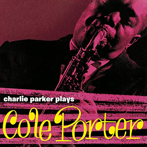 Charlie Parker playing saxophone, album cover with pink and yellow text.