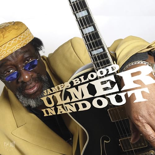 James Blood Ulmer with guitar, album cover with text "Ulmer In and Out".