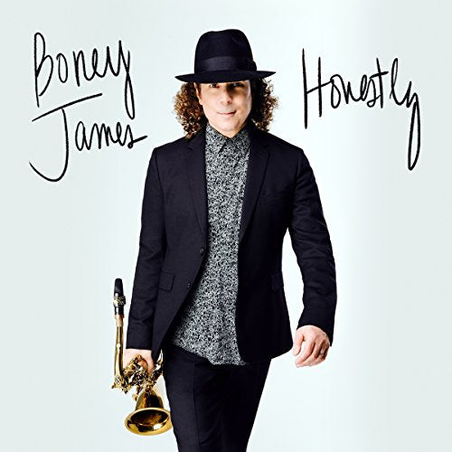 Boney James in a suit and hat, holding a saxophone.