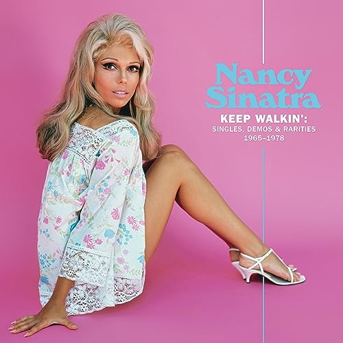 Nancy Sinatra album cover, pink background, seated portrait, 1965-1978.