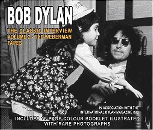 Bob Dylan CD cover featuring a black and white photo of Dylan with a child.
