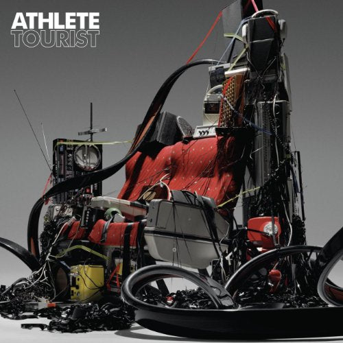 Album cover for “Tourist” by Athlete, featuring abstract sculpture of electronics.