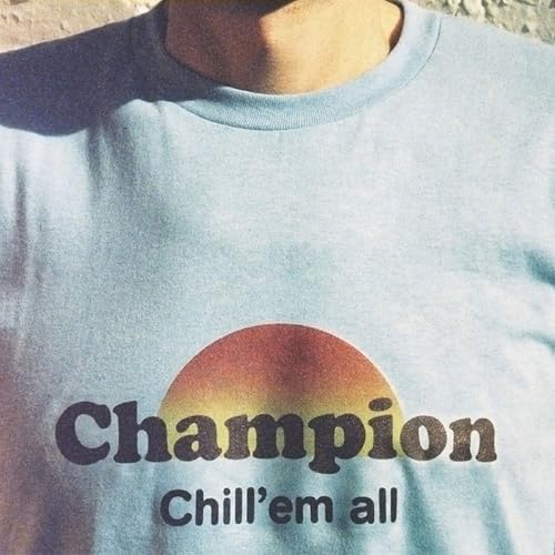 Light blue Champion t-shirt with a sunset and text design.