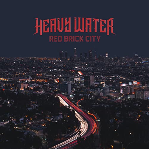 Album cover for Heavy Water’s “Red Brick City” showing a nighttime cityscape.