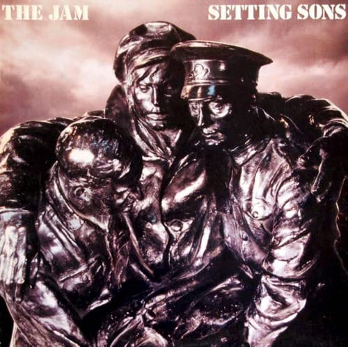 Album cover for The Jam’s “Setting Sons” featuring bronze statues.