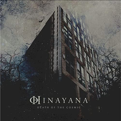 Dark album cover featuring a tall building and bare tree branches.