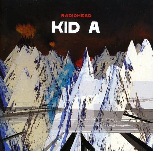 Kid A album cover: collage of mountains, roads, and volcanic eruption.